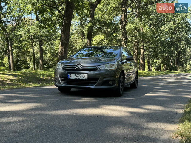 Серый Ситроен С4, объемом двигателя 1.56 л и пробегом 197 тыс. км за 7000 $, фото 1 на Automoto.ua