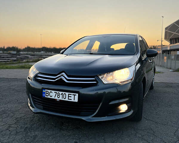 Серый Ситроен С4, объемом двигателя 1.56 л и пробегом 245 тыс. км за 7500 $, фото 1 на Automoto.ua