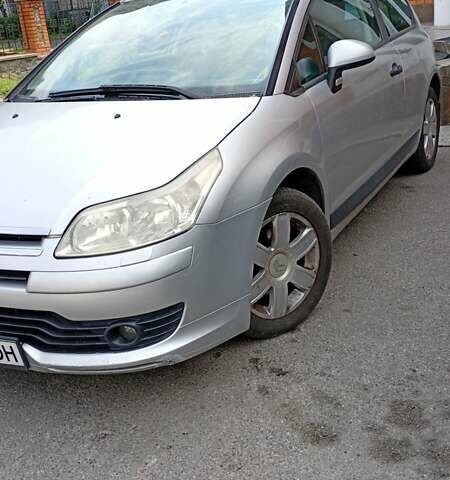 Серый Ситроен С4, объемом двигателя 1.59 л и пробегом 244 тыс. км за 4100 $, фото 1 на Automoto.ua