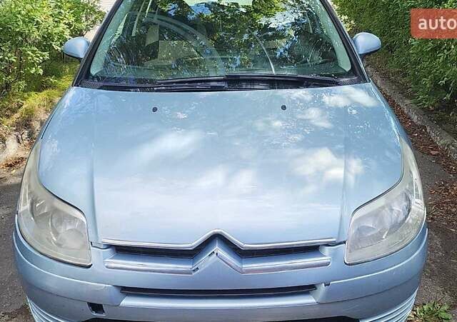 Синий Ситроен С4, объемом двигателя 1.6 л и пробегом 195 тыс. км за 3650 $, фото 1 на Automoto.ua