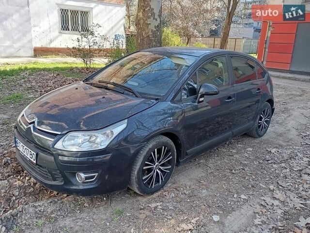 Синий Ситроен С4, объемом двигателя 1.59 л и пробегом 135 тыс. км за 3900 $, фото 1 на Automoto.ua
