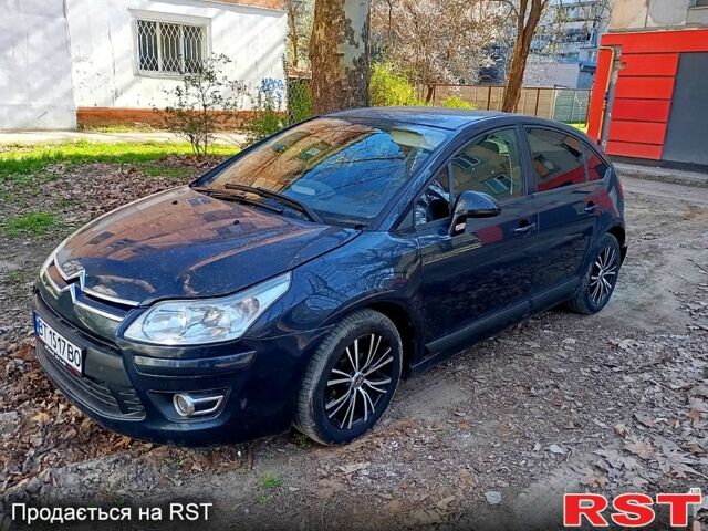 Синий Ситроен С4, объемом двигателя 1.6 л и пробегом 135 тыс. км за 4000 $, фото 1 на Automoto.ua
