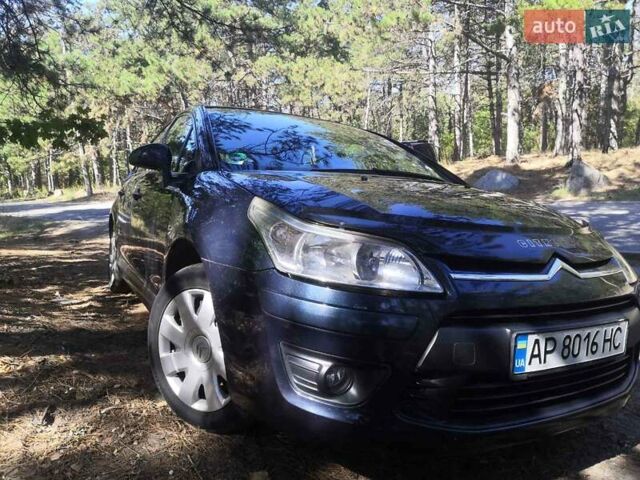 Синий Ситроен С4, объемом двигателя 1.6 л и пробегом 250 тыс. км за 4600 $, фото 1 на Automoto.ua