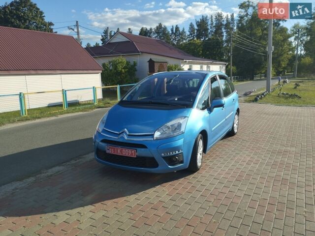 Синий Ситроен С4, объемом двигателя 1.59 л и пробегом 247 тыс. км за 5150 $, фото 1 на Automoto.ua