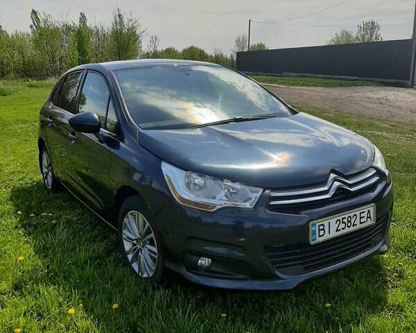 Синий Ситроен С4, объемом двигателя 1.6 л и пробегом 129 тыс. км за 6500 $, фото 1 на Automoto.ua