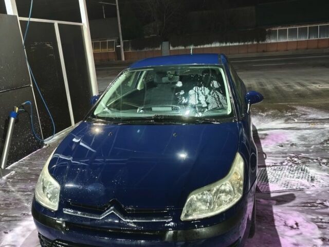 Синий Ситроен С4, объемом двигателя 1.6 л и пробегом 295 тыс. км за 3500 $, фото 1 на Automoto.ua