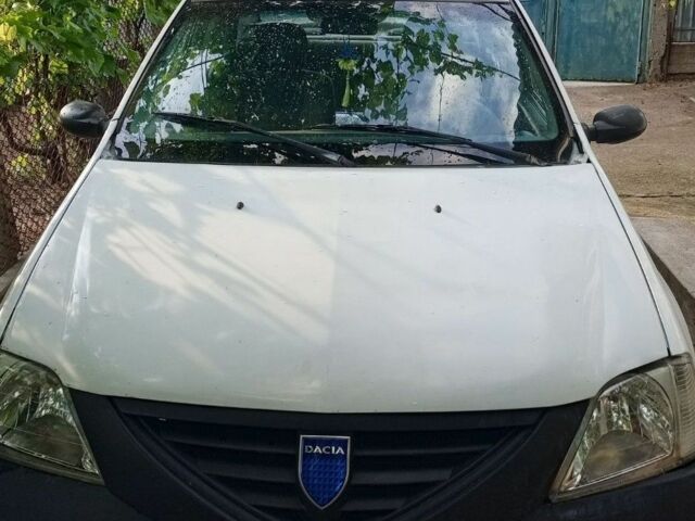 Белый Дачия Логан, объемом двигателя 1 л и пробегом 200 тыс. км за 1800 $, фото 1 на Automoto.ua