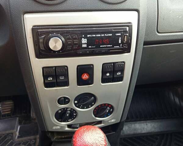 Червоний Дачія Logan, об'ємом двигуна 1.6 л та пробігом 247 тис. км за 5000 $, фото 1 на Automoto.ua