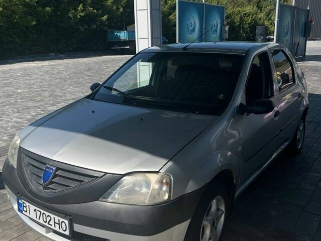 Серый Дачия Логан, объемом двигателя 1.4 л и пробегом 267 тыс. км за 3198 $, фото 1 на Automoto.ua