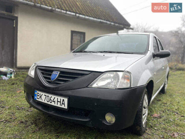 Сірий Дачія Logan, об'ємом двигуна 1.39 л та пробігом 246 тис. км за 1800 $, фото 1 на Automoto.ua