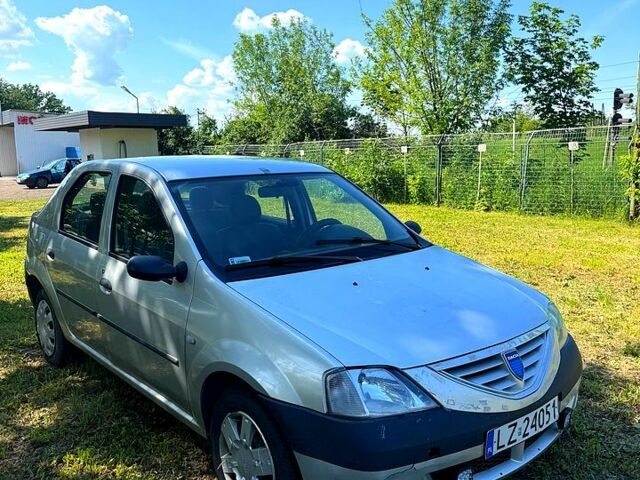 Серый Дачия Логан, объемом двигателя 1.4 л и пробегом 258 тыс. км за 1300 $, фото 1 на Automoto.ua