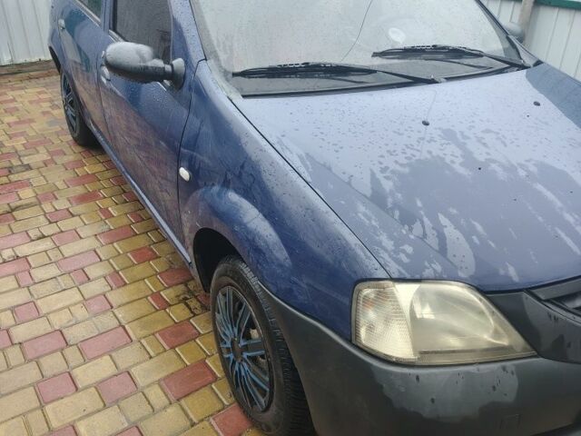 Синий Дачия Логан, объемом двигателя 1.4 л и пробегом 250 тыс. км за 2100 $, фото 1 на Automoto.ua