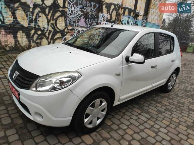 Белый Дачия Сандеро, объемом двигателя 1.4 л и пробегом 166 тыс. км за 4550 $, фото 1 на Automoto.ua
