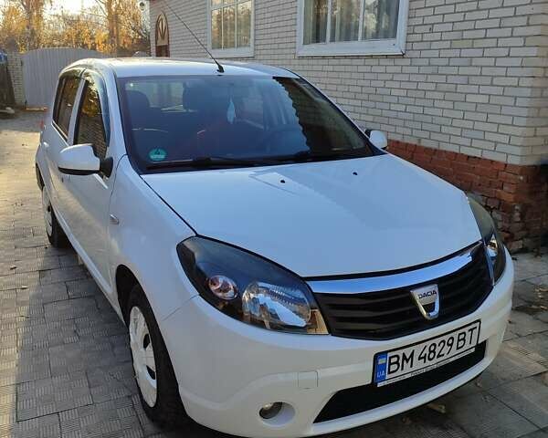 Белый Дачия Сандеро, объемом двигателя 1.15 л и пробегом 138 тыс. км за 5200 $, фото 1 на Automoto.ua