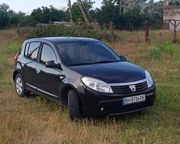 Черный Дачия Сандеро, объемом двигателя 1.6 л и пробегом 180 тыс. км за 5300 $, фото 1 на Automoto.ua