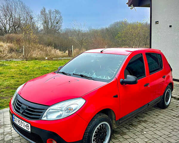 Красный Дачия Сандеро, объемом двигателя 1.39 л и пробегом 200 тыс. км за 3500 $, фото 1 на Automoto.ua