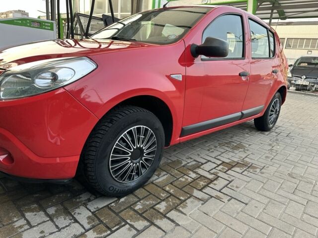 Червоний Дачія Sandero, об'ємом двигуна 1.4 л та пробігом 162 тис. км за 4300 $, фото 1 на Automoto.ua