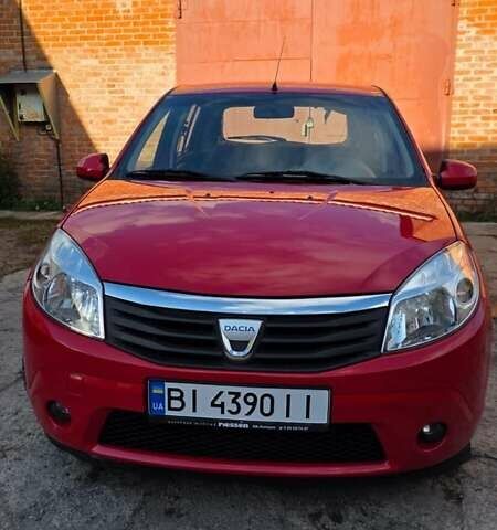 Красный Дачия Сандеро, объемом двигателя 1.4 л и пробегом 176 тыс. км за 5500 $, фото 1 на Automoto.ua