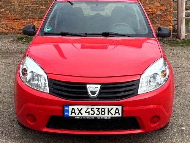 Красный Дачия Сандеро, объемом двигателя 1.4 л и пробегом 230 тыс. км за 4200 $, фото 1 на Automoto.ua