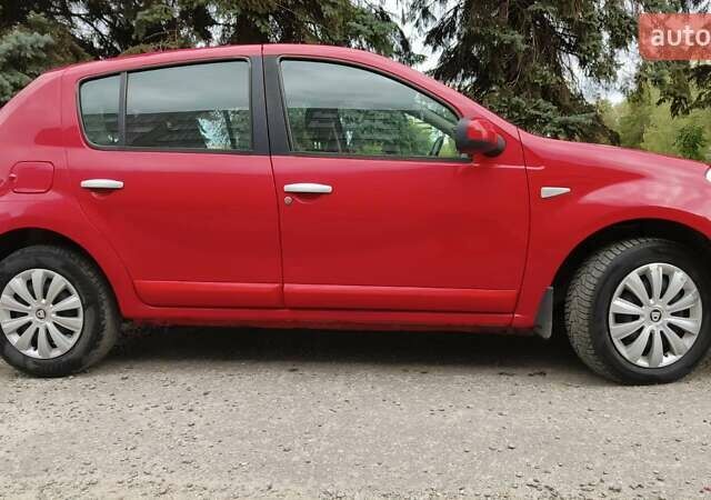 Червоний Дачія Sandero, об'ємом двигуна 1.4 л та пробігом 173 тис. км за 4300 $, фото 1 на Automoto.ua