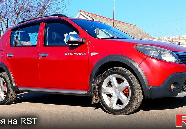 Красный Дачия Сандеро, объемом двигателя 1.6 л и пробегом 149 тыс. км за 6800 $, фото 1 на Automoto.ua