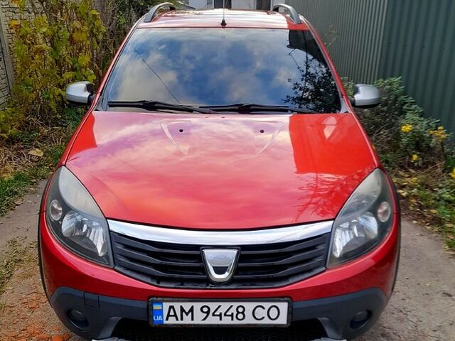 Красный Дачия Сандеро, объемом двигателя 1.6 л и пробегом 153 тыс. км за 5200 $, фото 1 на Automoto.ua