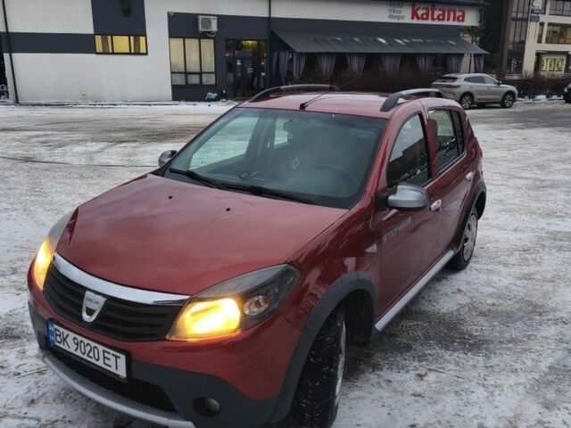 Красный Дачия Сандеро, объемом двигателя 1.6 л и пробегом 131 тыс. км за 5700 $, фото 1 на Automoto.ua