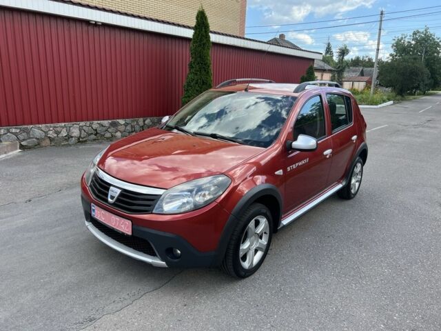 Червоний Дачія Sandero, об'ємом двигуна 1.6 л та пробігом 148 тис. км за 6400 $, фото 1 на Automoto.ua