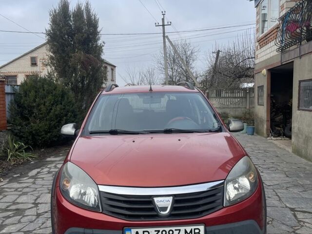 Красный Дачия Сандеро, объемом двигателя 1.6 л и пробегом 145 тыс. км за 5900 $, фото 1 на Automoto.ua