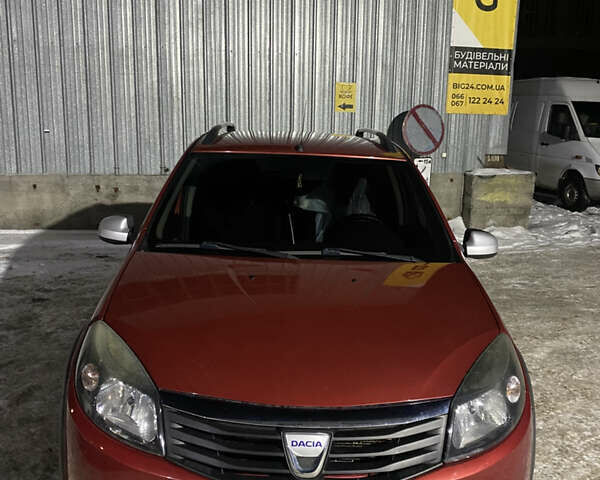 Красный Дачия Сандеро, объемом двигателя 1.6 л и пробегом 243 тыс. км за 6500 $, фото 1 на Automoto.ua