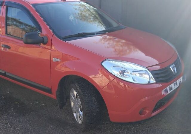 Красный Дачия Сандеро, объемом двигателя 1.2 л и пробегом 168 тыс. км за 4250 $, фото 1 на Automoto.ua