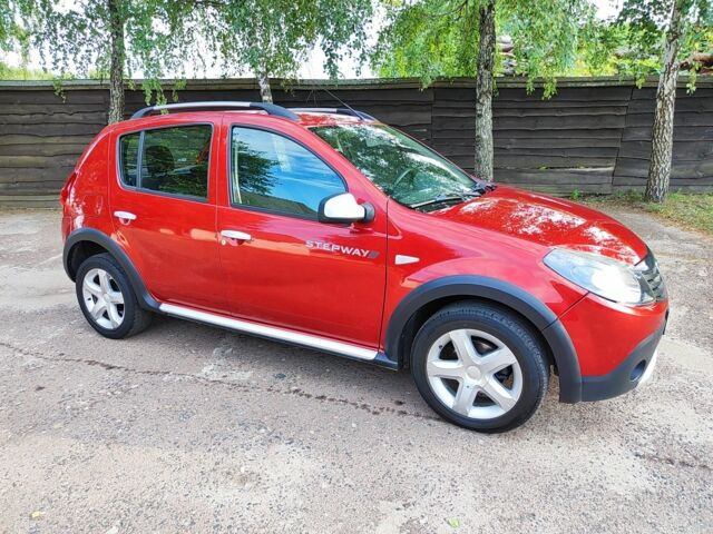 Красный Дачия Сандеро, объемом двигателя 6 л и пробегом 157 тыс. км за 6550 $, фото 1 на Automoto.ua