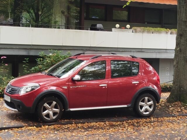 Червоний Дачія Sandero, об'ємом двигуна 2 л та пробігом 200 тис. км за 6398 $, фото 1 на Automoto.ua