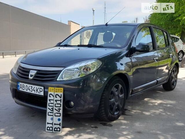 Сірий Дачія Sandero, об'ємом двигуна 1.4 л та пробігом 145 тис. км за 4750 $, фото 1 на Automoto.ua