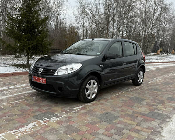 Сірий Дачія Sandero, об'ємом двигуна 1.4 л та пробігом 147 тис. км за 4950 $, фото 1 на Automoto.ua