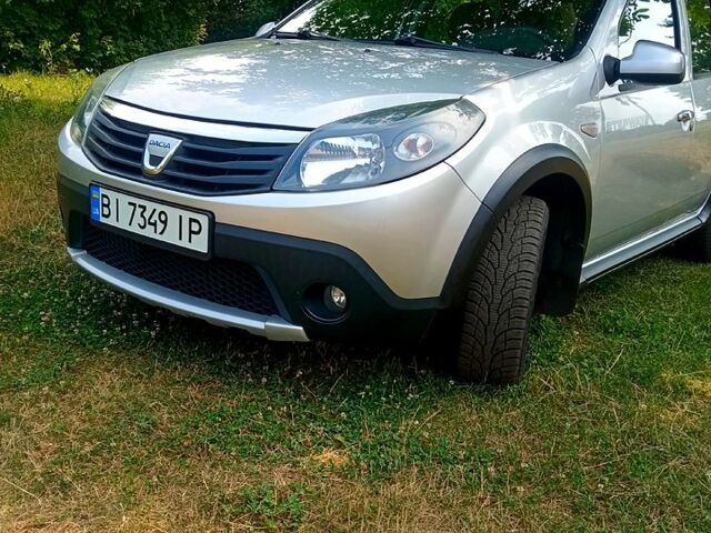Сірий Дачія Sandero, об'ємом двигуна 1.6 л та пробігом 174 тис. км за 7200 $, фото 1 на Automoto.ua