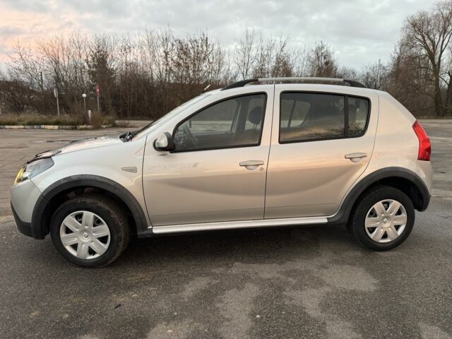 Серый Дачия Сандеро, объемом двигателя 1.6 л и пробегом 199 тыс. км за 6999 $, фото 1 на Automoto.ua