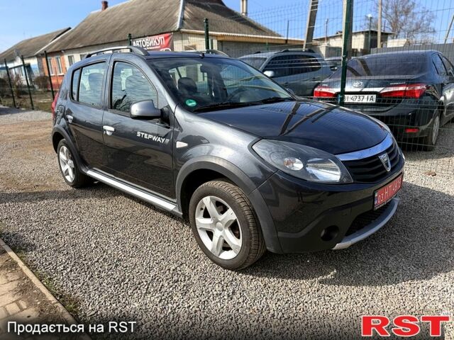 Серый Дачия Сандеро, объемом двигателя 1.6 л и пробегом 200 тыс. км за 6800 $, фото 1 на Automoto.ua