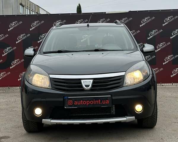 Серый Дачия Сандеро, объемом двигателя 1.6 л и пробегом 192 тыс. км за 6500 $, фото 1 на Automoto.ua
