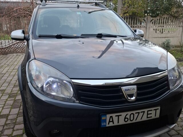Серый Дачия Сандеро, объемом двигателя 1.6 л и пробегом 200 тыс. км за 6400 $, фото 1 на Automoto.ua
