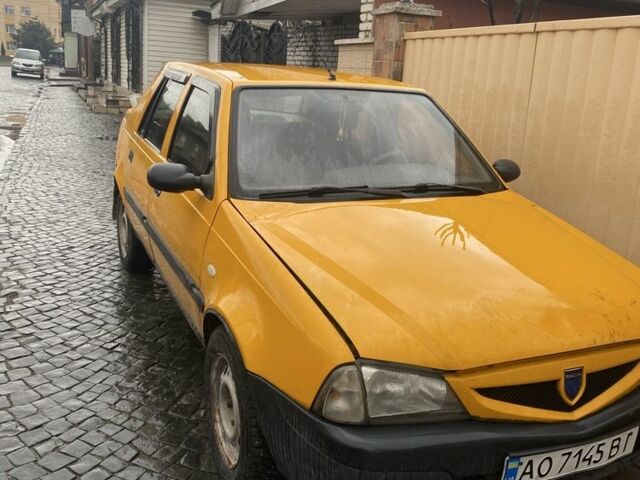 Желтый Дачия Соленза, объемом двигателя 1.4 л и пробегом 180 тыс. км за 1000 $, фото 1 на Automoto.ua