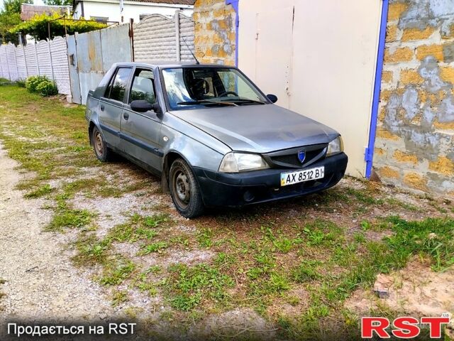 Сірий Дачія Solenza, об'ємом двигуна 1.4 л та пробігом 200 тис. км за 1250 $, фото 1 на Automoto.ua