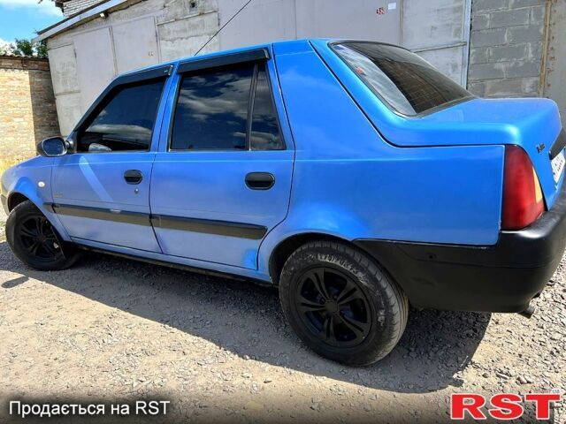 Синий Дачия Соленза, объемом двигателя 1.4 л и пробегом 265 тыс. км за 1600 $, фото 1 на Automoto.ua