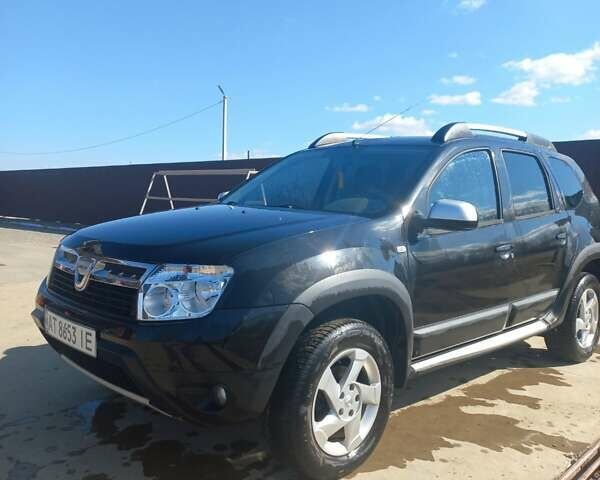 Черный Дачия Duster, объемом двигателя 1.6 л и пробегом 100 тыс. км за 7450 $, фото 1 на Automoto.ua