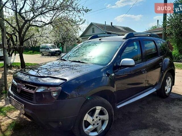 Черный Дачия Duster, объемом двигателя 1.6 л и пробегом 143 тыс. км за 8500 $, фото 1 на Automoto.ua