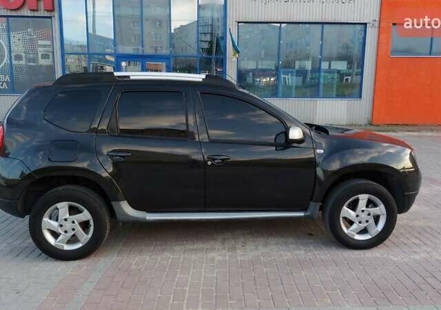 Чорний Дачія Duster, об'ємом двигуна 1.6 л та пробігом 209 тис. км за 9200 $, фото 1 на Automoto.ua