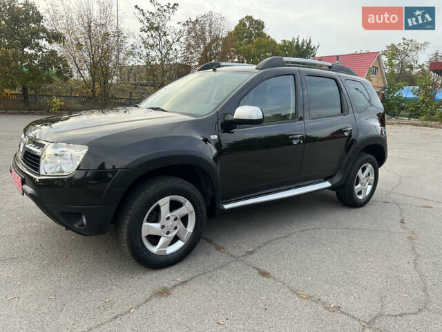 Чорний Дачія Duster, об'ємом двигуна 1.6 л та пробігом 230 тис. км за 7950 $, фото 1 на Automoto.ua