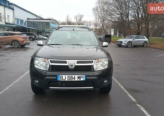 Черный Дачия Duster, объемом двигателя 1.6 л и пробегом 240 тыс. км за 8000 $, фото 1 на Automoto.ua