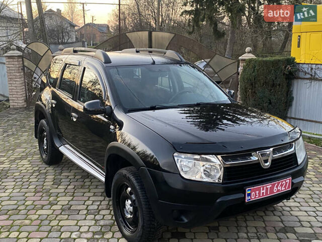 Чорний Дачія Duster, об'ємом двигуна 1.6 л та пробігом 210 тис. км за 8550 $, фото 1 на Automoto.ua