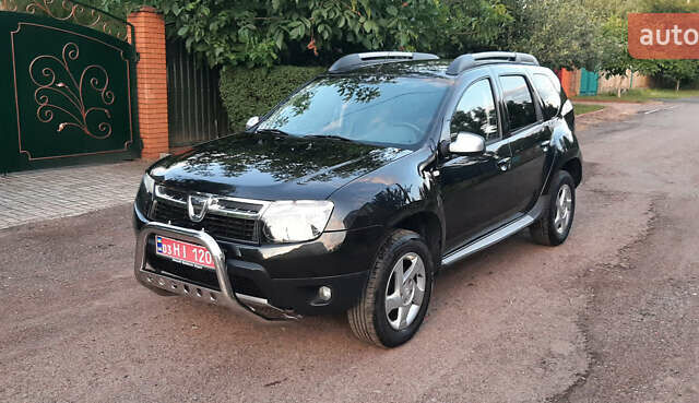 Черный Дачия Duster, объемом двигателя 1.6 л и пробегом 210 тыс. км за 9199 $, фото 1 на Automoto.ua